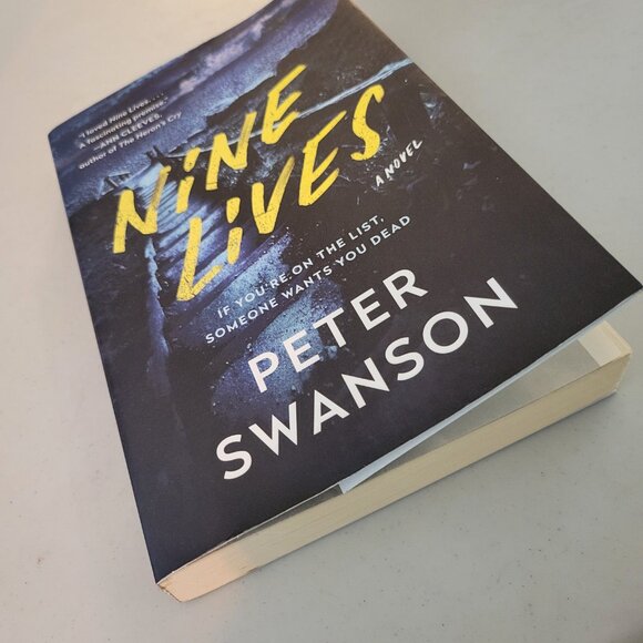 NINE LIVES PAPERBACK THRILLER NOVEL BY AUTHOR PETER SWANSON - GUC - Picture 2 of 6